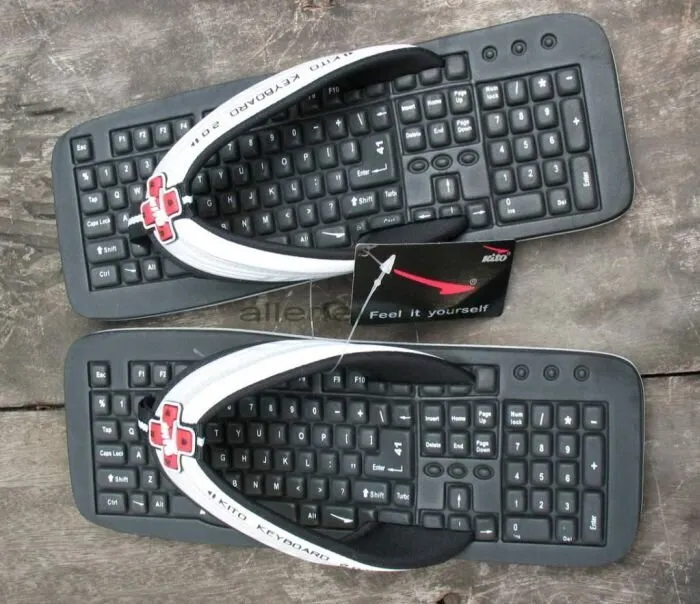 A Dozen Of Funny Secret Santa Gifts That Will Make You Stop Believing In Santa 7 keyboard slippers