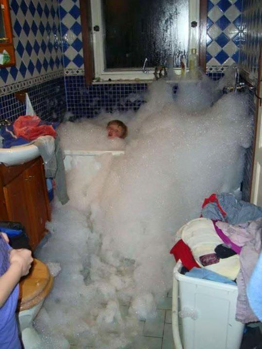 27 Terrifying Images That Show What Its Really Like To Be A Parent 11 kid in tub