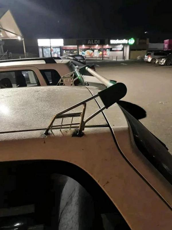 20 Photos That Raise More Questions Than Answers 20 trolley on car - Photos That Raise More Questions Than Answers