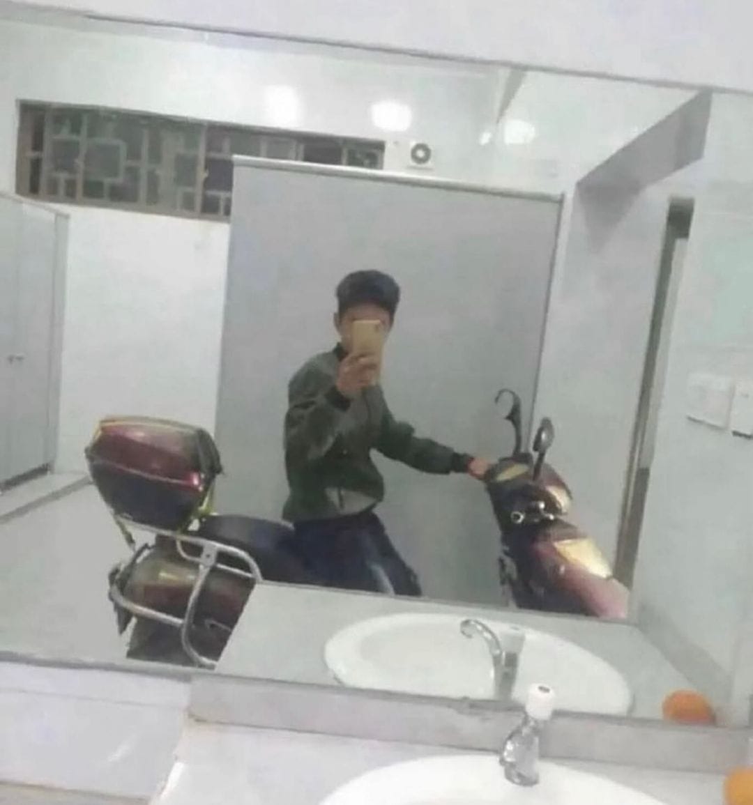 25 Eccentric Human Moments Showcased on 'Humans Doing Human Things' 2 Bike in toilet - Eccentric Human Moments