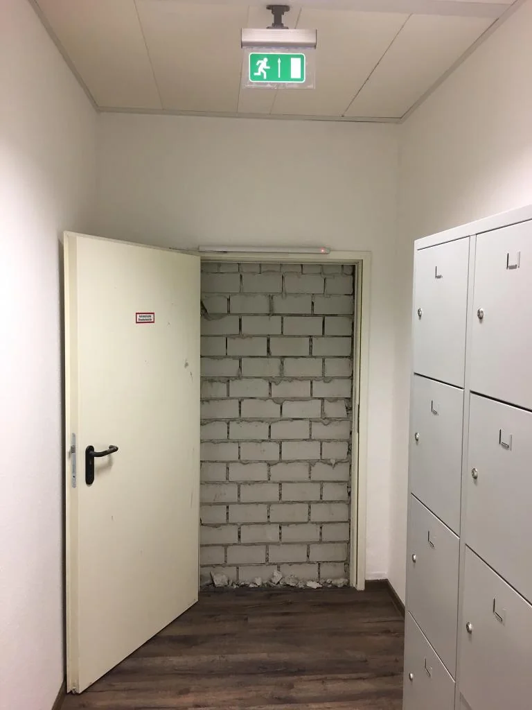 "OSHA Violation But OK": 20 Risky Acts of Workplace Safety Defiance 2 Emergency "exit" in a friend's office building. First time they opened it was DURING A FIRE ALARM - OSHA Violation