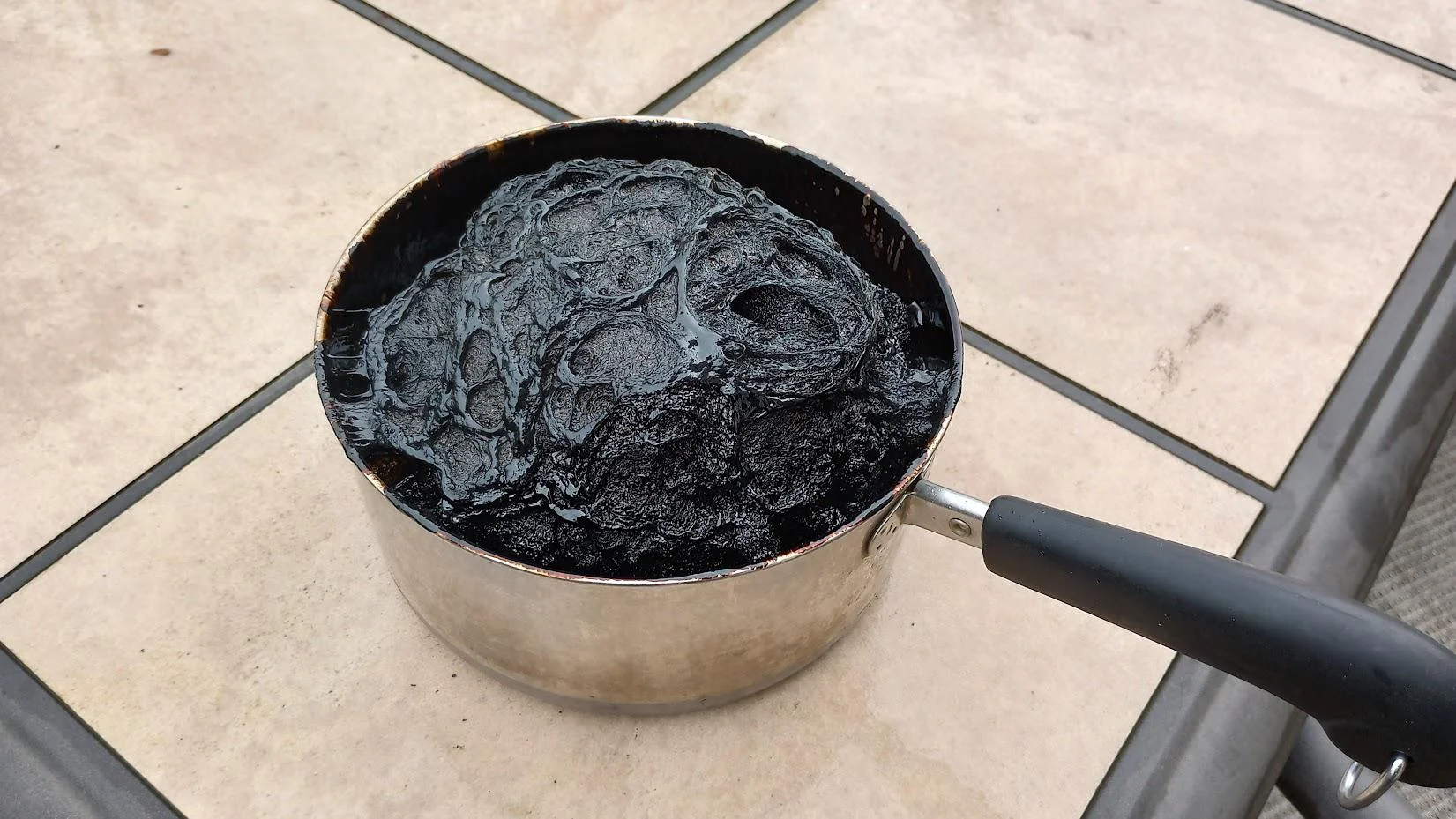 20 Epic Cooking Fails That Tested the Limits of Edibility 8 Fiance accidentally left a pot of simple syrup on the stove to burn and made an asteroid - cooking fails