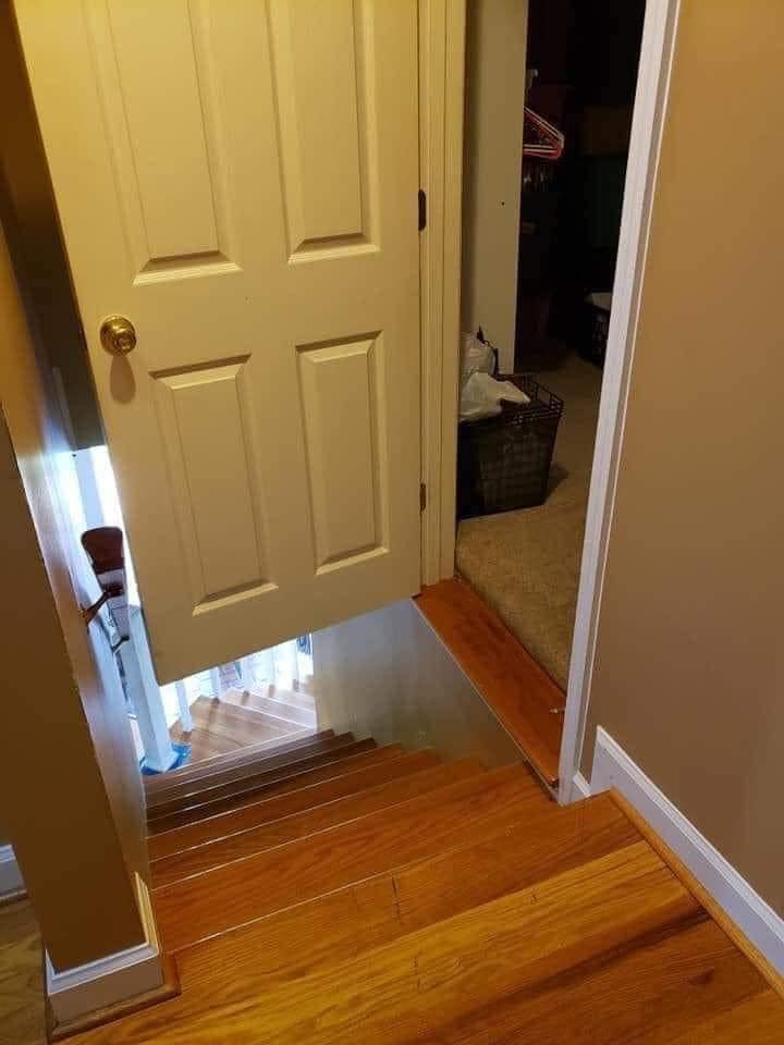 25 Real Estate Photos That Deserve Their Own Horror Movie 5 Door opens on staircase
