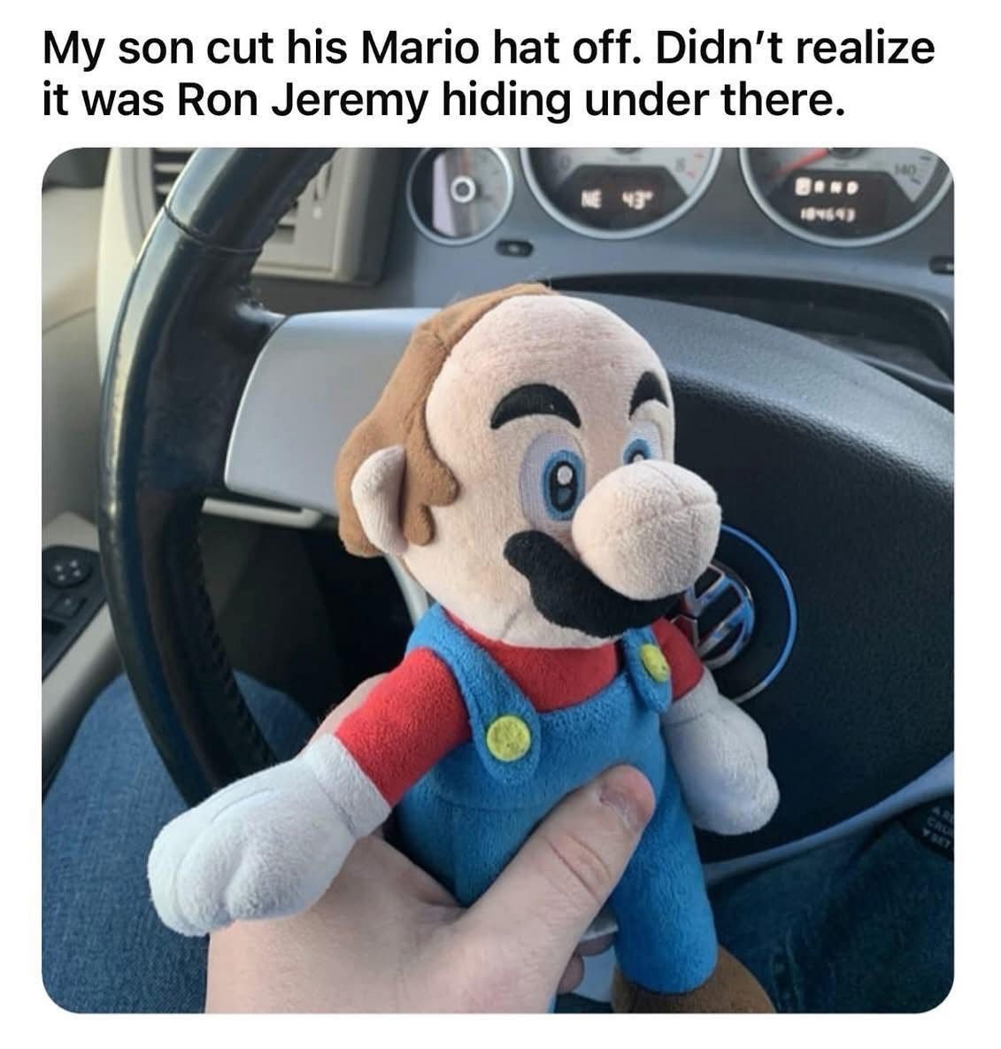 cut his mario hat off
