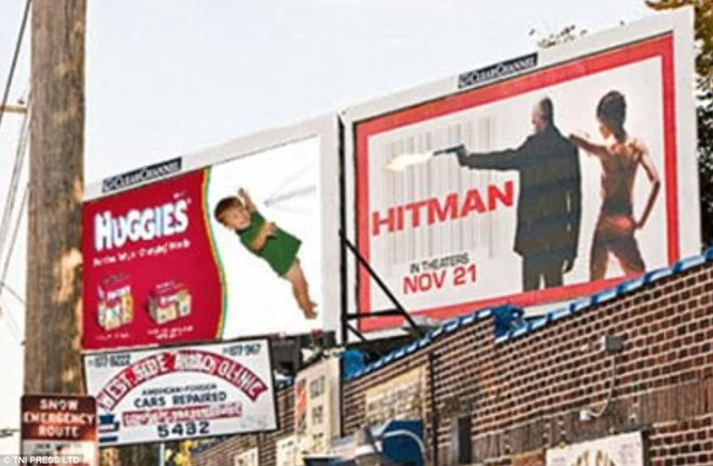 Huggies.....Hitman - 2 Billboards close to each other bringing a funny meaning
