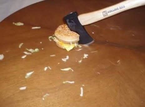 Cutting burger with axe