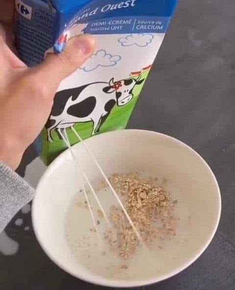 Pouring milk from carton