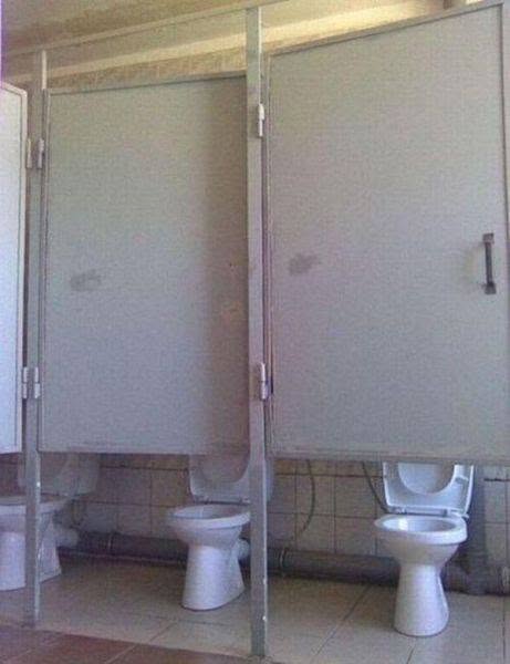 20 Unbelievable Fails That Belong in a Museum of Regret 16 These cubicles weren't designed for privacy.