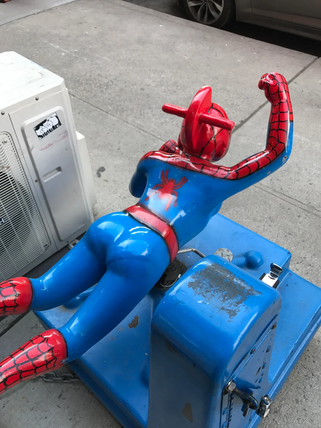 20 Playground Fails That Turned Childhood Into an Extreme Sport 20 This Spiderman children's ride has a visible panty line..webp